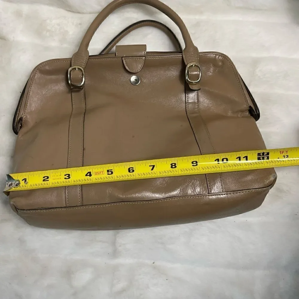 Tano Leather tan frame medium satchel gold tone hardwares .